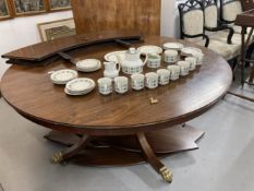 Mid 20th cent. Regency reproduction mahogany Jupp style circular table on four supports, with lion