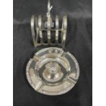 Hallmarked Silver: Ashtray hallmarked Birmingham 4½ins. Weight 4oz. Toast rack hallmarked Sheffield,