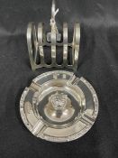 Hallmarked Silver: Ashtray hallmarked Birmingham 4½ins. Weight 4oz. Toast rack hallmarked Sheffield,