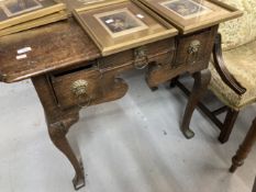 19th cent. Oak lowboy with moulded top with front re-entrant corners, fitted two small side