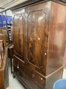 19th cent. Figured mahogany linen press with two over one drawer unit on bracket supports minus