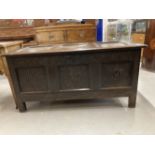 Late 18th cent. Oak three panel coffer with carved decoration. 21½ins. x 51ins. x 25ins.