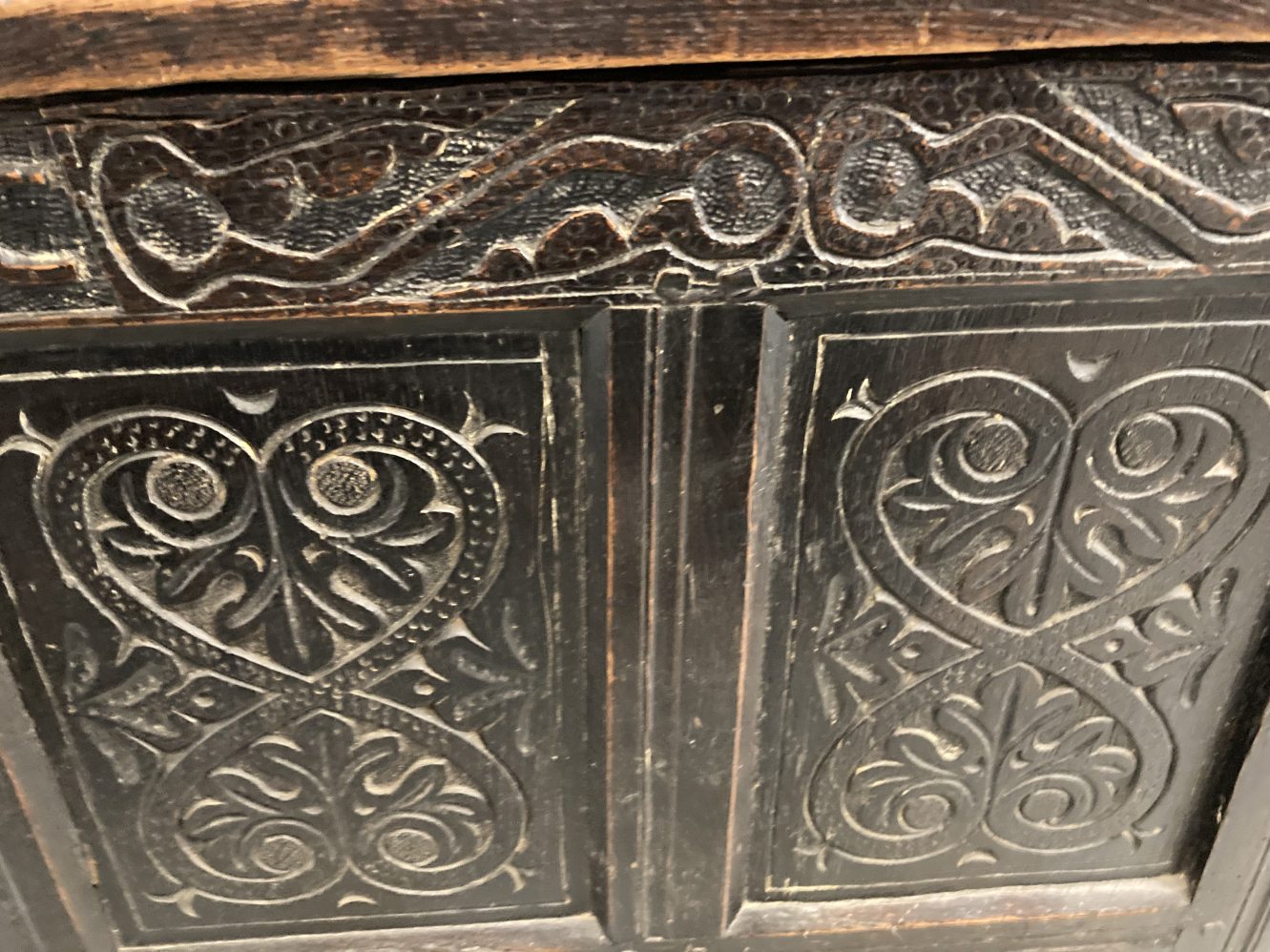 Antique oak coffer with four panelled top and front with carved panels. Carved frieze with date 1692 - Image 2 of 5