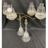 1890-1900 Clarke's cricklite candle holder twin lamp glasses on brass fittings, a pair.