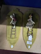 20th cent. ceramics: Crown Naples wall plaques lovers on ladders. A pair. 9ins.