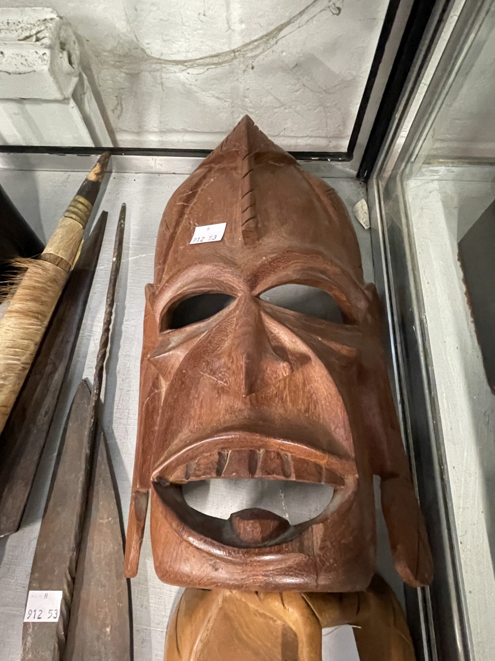 Tribal Artefacts: Includes ebony female bust, three wooden masks, a figure and four weapons. - Image 5 of 6