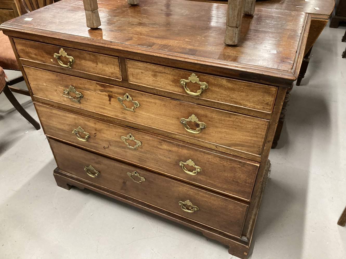 Antique mahogany small straight fronted chest of drawers with moulded crossbanded top, fitted