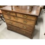 Antique mahogany small straight fronted chest of drawers with moulded crossbanded top, fitted