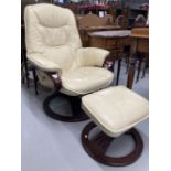 Late 20th cent. Furniture. Parker Knoll style cream leather reclining chair with footstool, mahogany