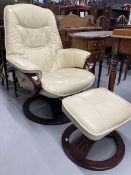 Late 20th cent. Furniture. Parker Knoll style cream leather reclining chair with footstool, mahogany