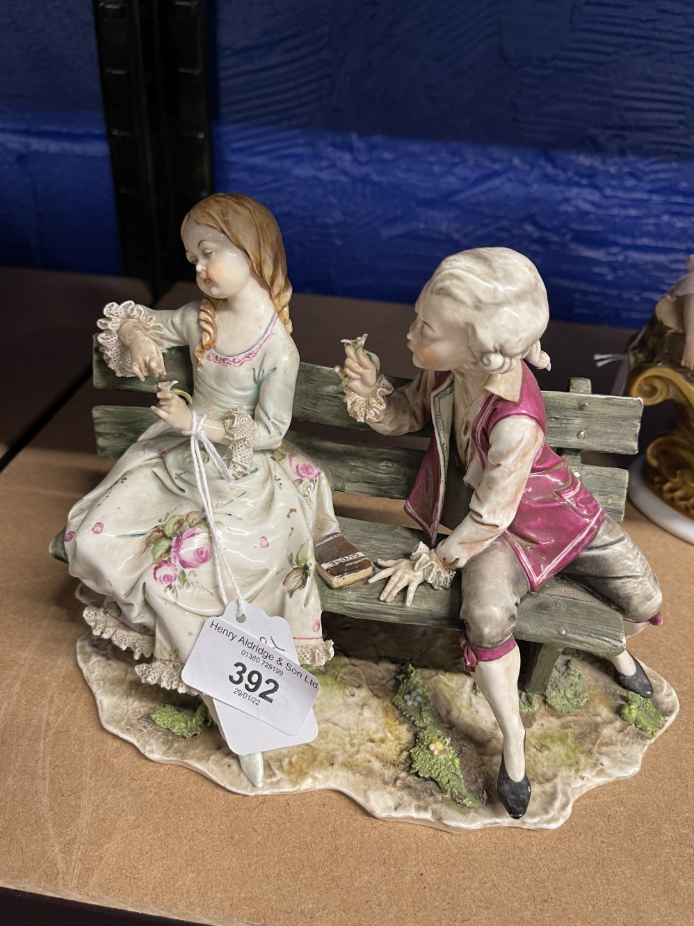 20th cent. Crown Naples lovers seated on a bench, N mark in underglaze blue. - Image 2 of 3