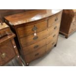 Georgian mahogany bow fronted two over three chest of drawers with original brass furniture