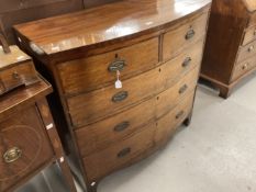 Georgian mahogany bow fronted two over three chest of drawers with original brass furniture