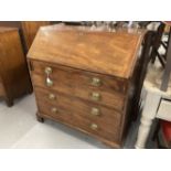 Early Georgian mahogany bureau with finely fitted interior over four graduated drawers, with