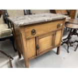 Arts style oak washstand with marble top, brass fittings and squared chamfered supports. 30ins. x