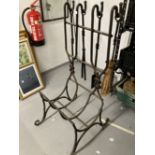 Metalware: Wrought iron log and tool holder, rods with reef knot decoration, brush, shovel, tongs