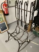 Metalware: Wrought iron log and tool holder, rods with reef knot decoration, brush, shovel, tongs