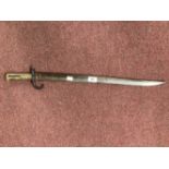 Militaria/Edged Weapons: 19th cent. Chassepot bayonet with brass grip and metal scabbard. 21½ins.