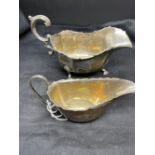 Hallmarked Silver: Gravy boat on three hoof feet hallmarked London, and one creamer hallmarked