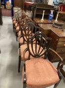 19th cent. Harlequin set of eight mahogany shield back chairs with two carvers.
