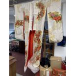Mid 20th cent. Oriental silk wedding kimono decorated with gold line embroidery, phoenix flying