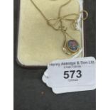 Hallmarked Jewellery: 9ct gold zip link chain with a pendant attached set with an oval opal.