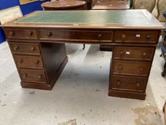 19th cent. Mahogany pedestal desk, the top with moulded edge and green gold tooled leather above