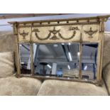 19th cent. Gilt over mantel mirror with a sphere decorated cornice over a frieze with swags and