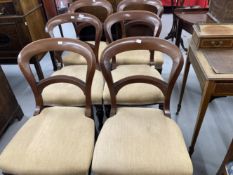 Victorian mahogany balloon back dining chairs, upholstered seats on octagonal turned legs. (6)