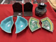 Chinese bat shaped bowls, a pair, famille verte dishes, a pair, lacquer bookends, a pair and a brass