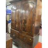19th cent. Figured mahogany linen press with two over one drawer unit on bracket supports minus