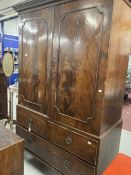 19th cent. Figured mahogany linen press with two over one drawer unit on bracket supports minus