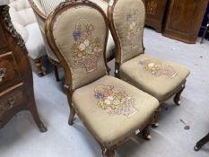 Late 19th cent. Walnut framed upholstered nursing chairs with turned and fluted legs on castors, a