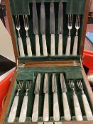 Hallmarked Silver: Fruit knives and forks with mother of pearl handles, Sheffield, in mahogany