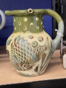 West Country Pottery: Lauder Barum puzzle jug fish and seaweed decoration, inscribed to base