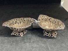 Hallmarked Silver: Oval pierced mini bon bon dishes, a pair. Hallmarked London. Weight 2.7oz.