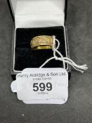Hallmarked Gold: 18ct. ring, band with leaf decoration hallmarked Chester. Ring size N. Weight 5.