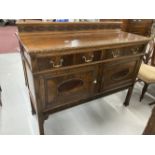 1920s mahogany sideboard two drawers above two cupboards decorated in the Jacobean style with