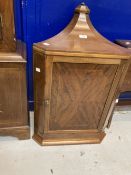 19th cent. Mahogany corner cabinet of small proportions with inlay decoration.