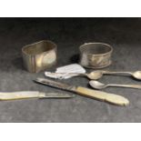 Hallmarked Silver: Two napkin rings, three salt spoons and two fruit knives with mother of pearl