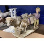 20th cent. Ceramics: Royal Dux porcelain figure of a boy herding cattle, the boy is barefoot herding