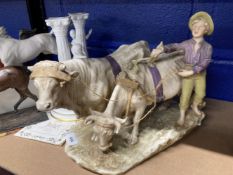 20th cent. Ceramics: Royal Dux porcelain figure of a boy herding cattle, the boy is barefoot herding