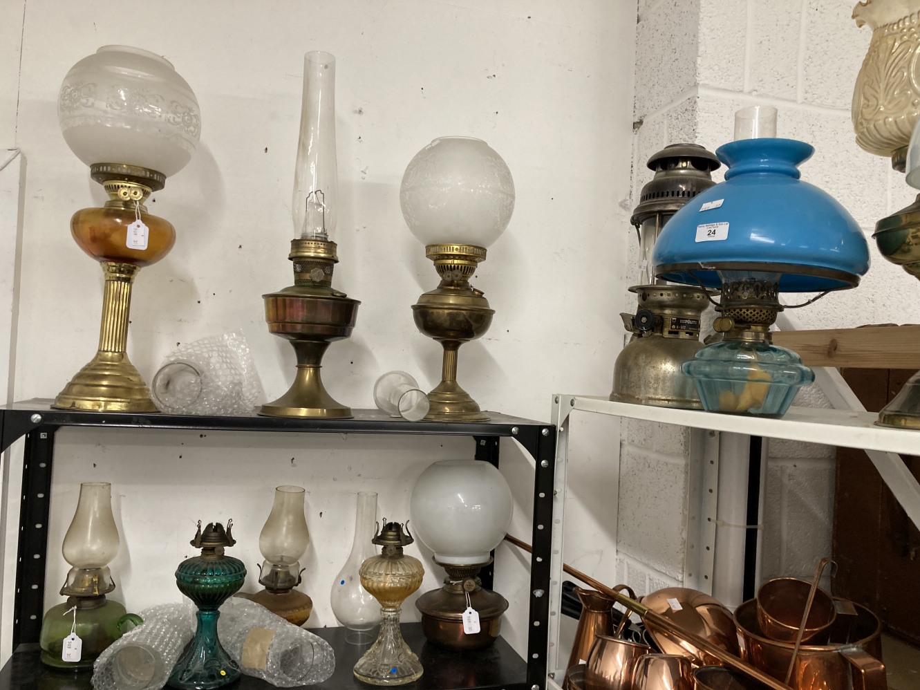 Lighting: Oil lamps to include Duplex Aladdin Gem fire brass lamps, Hipolto lamp, T. Bowatt & Son