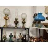 Lighting: Oil lamps to include Duplex Aladdin Gem fire brass lamps, Hipolto lamp, T. Bowatt & Son