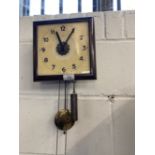 Clocks: Early 20th cent. Regulator clock with glass face and Arabic numerals.