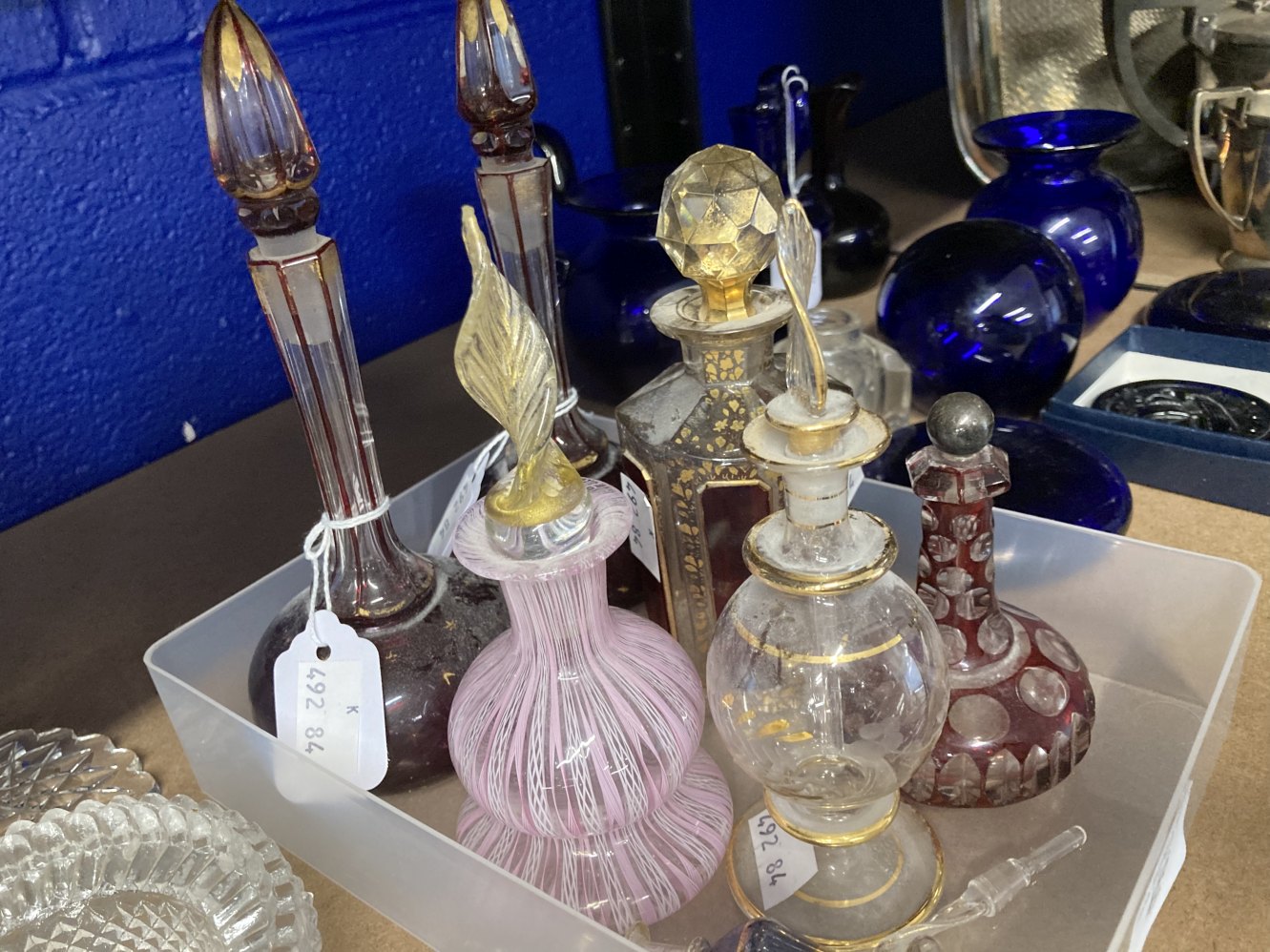 Late 19th cent. Bohemian hexagonal cut glass scent bottle with stopper, a pair of ruby red scent