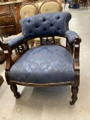 Early 20th cent. Mahogany upholstered chair on turned ring legs.