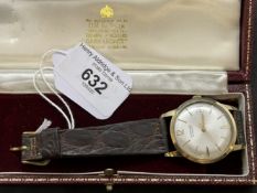 Watches: 9ct gold gentlemen's Garrard automatic wristwatch, silver coloured dial with amethyst three