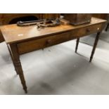 19th cent. Mahogany two drawer side table on turned ring legs. 48ins. x 16ins. x 27¾ins.