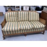 1930s style Bergere three seater sofa with striped upholstery. 69ins.
